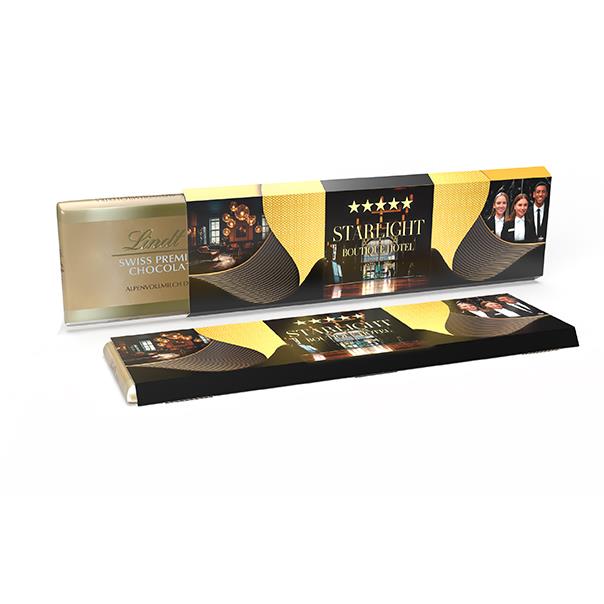 Lindt Alpenvollmilch Extra Tafel im Werbeschuber